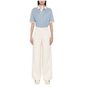 NWT Womens adidas Montreal jeans. Wide leg. Measured 16.5” waist. 31.5” inseam.